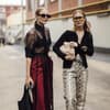Zwei Frauen mit Sonnenbrille auf der Mailänder Fashion Week Zwei Frauen mit Sonnenbrille auf der Mailänder Fashion Week