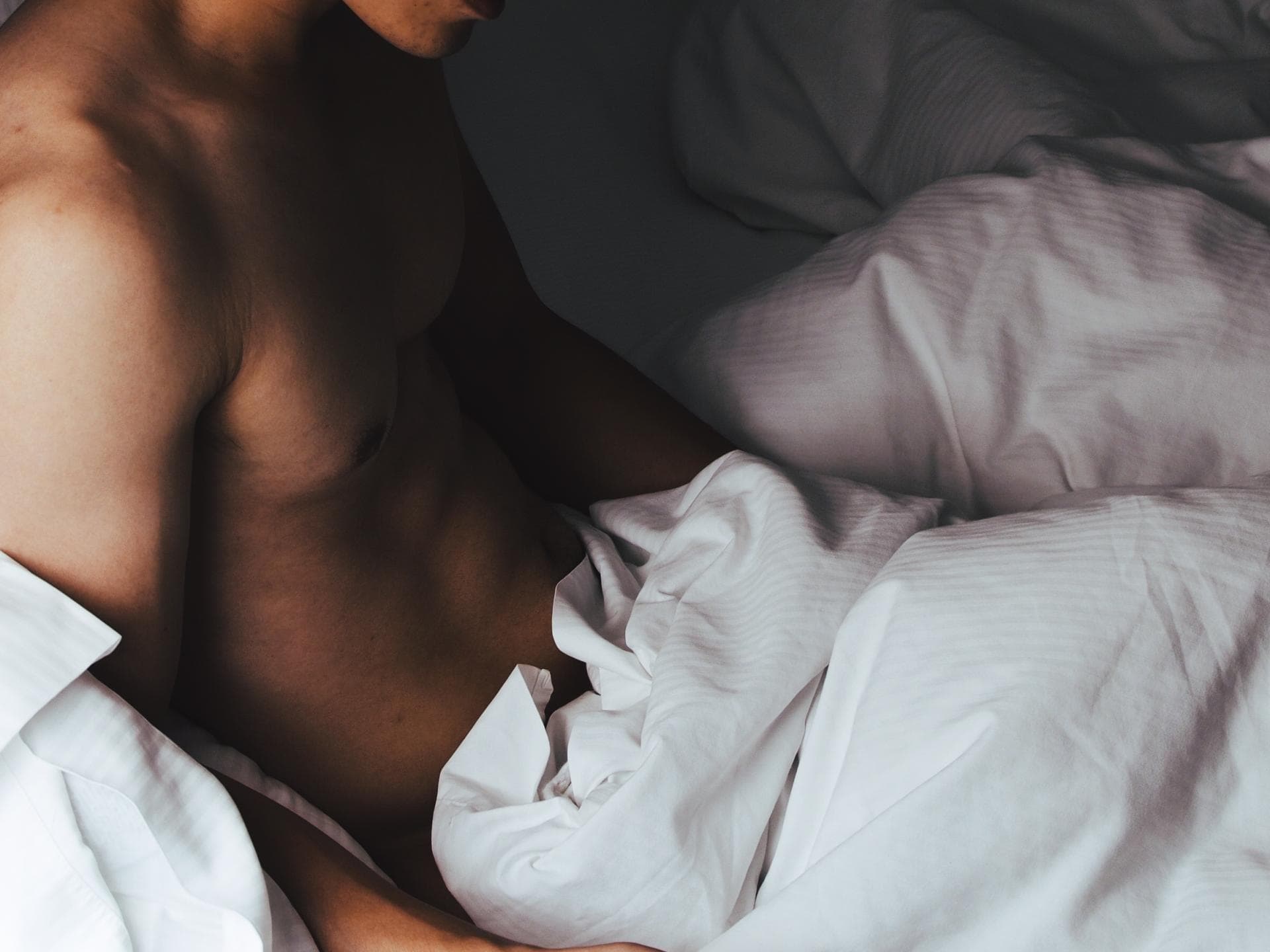 Sexspielzeug für Männer Mann im Bett